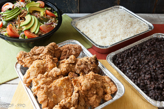 Classic Platos: choice of protein, garlic coconut rice, black beans and salad